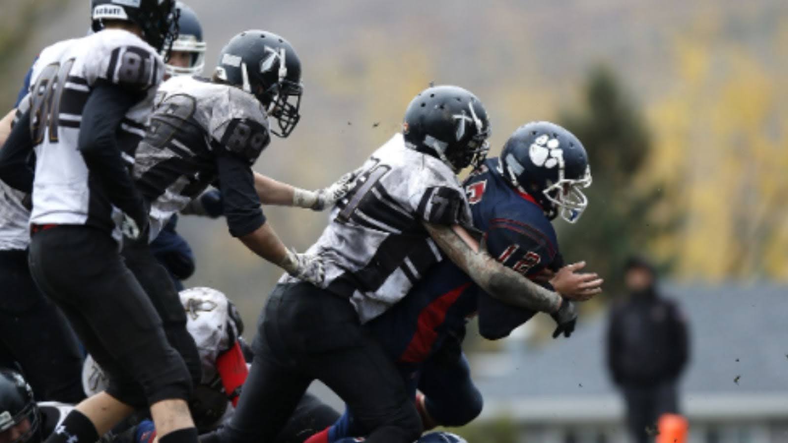 professional American football players in action